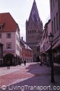 35. Soest (East of Dortmund, Germany) Centre of large village repaved as pedestrian area (some service traffic allowed). Paving colour in sympathy with building colour, and patterned to break up an otherwise large expanse resulting from kerb removal.